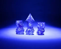 Sirius Dice: Cloak & Dagger, Premium UV-Light Translucent Pink - Dice Set